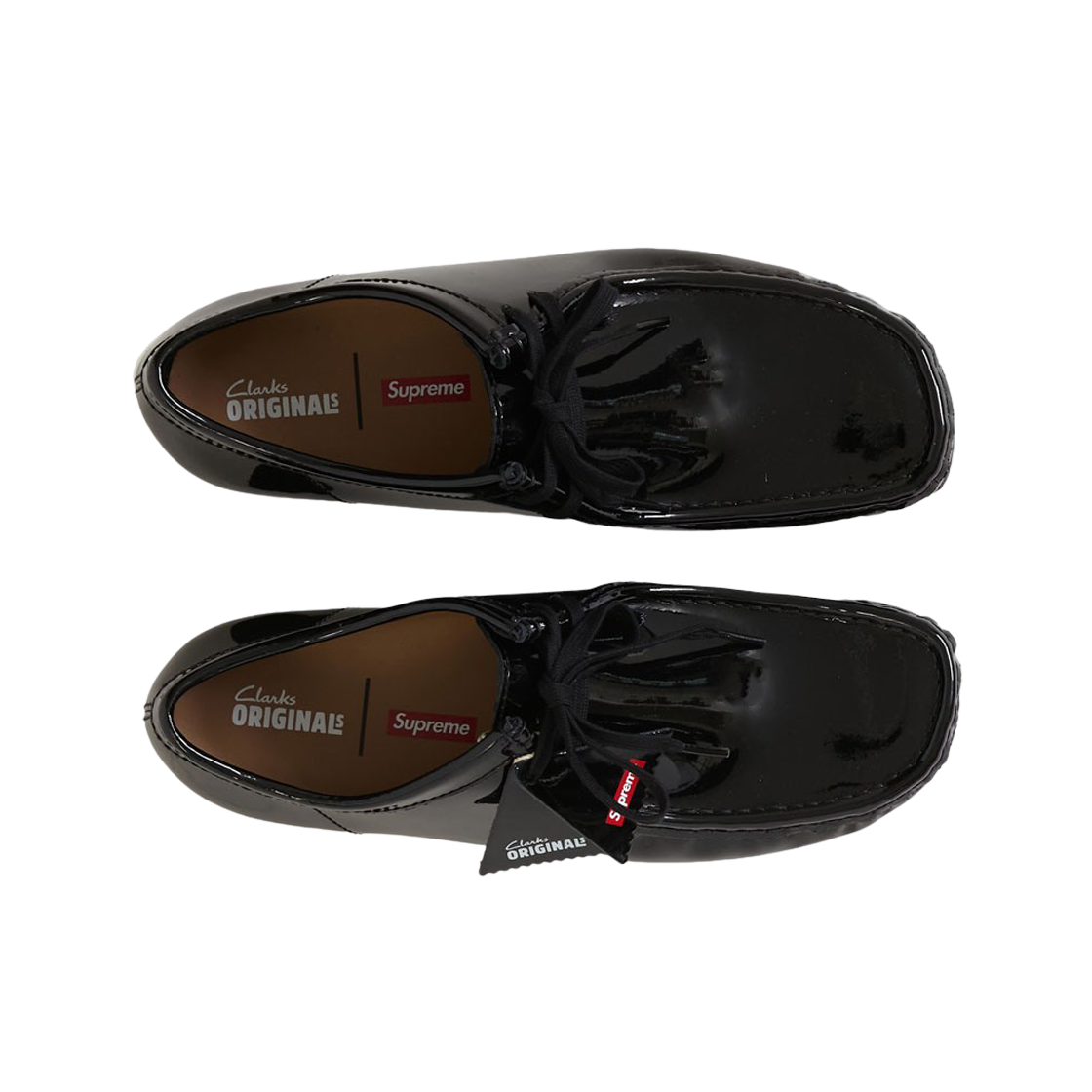Wallabee Clarks x Supreme en cuir verni noir